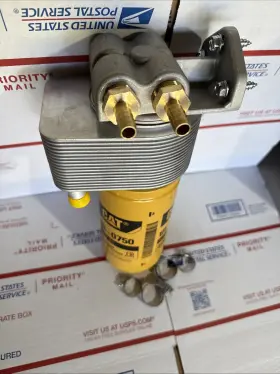 1r-0750 Wvoheater.com 7587 Diesel Fuel Heater/filter Device With Cat Filter 1r-0750. 3 Micron Absolute 3/8