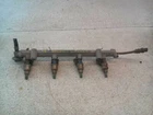 2.4L Fuel Injector Set With Rail For 1996 Mitsubishi Galant Used. Price: $79.95.