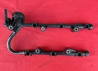 Genuine Fuel Injector Rail For 2010-2016 Toyota And Lexus 3.5L V6 # 23250-0P010 Used. Price: $99.00.