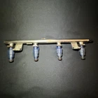 Audi A4 B6 1.8T Gasoline Fuel Rail And Injectors 06B133317N Used. Price: $54.99.