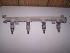 94-98 Galant 2.4 Engine Fuel Injection Rail Used. Price: $74.14.