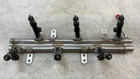 Jeep Wrangler Jk Oem Fuel Rail Injectors 3.8L 2007 2008 2009 2010 2011 168792 Used. Price: $55.54.