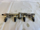 2002-2008 Mini Cooper 1.6L Supercharged Fuel Injection Ramp Rail W/ Injectors Used. Price: $75.00.