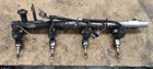 Genuine Fuel Rail W/ Injector Harness 12729341, 12691508 2.7L Turbo Chevy Gmc Used. Price: $50.00.