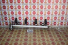 2001-2005 Volkswagen Beetle 1.8L Fuel Rail W/ Injector Set 06A-133-681-B Oem Used. Price: $84.99.