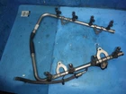 5.4 Ford Engine Fuel Rail 5C3E-9F792-DD W/ Injectors 7C3E-AB Used. Price: $59.99.