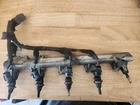 Mazdaspeed 3 Oem Fuel Injectors W/complete Rail And Harness Used. Price: $280.00.