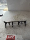 2010 Dodge Caliber Fuel Injectors & Rail 04891575AA Used. Price: $47.36.