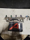 01-03 Mazda Protege 2.0L Complete Fuel Rail W/4(2 Red Green) Injectors Oem Used. Price: $79.62.