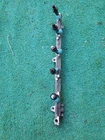 01-05 Lexus IS300 Fuel Rail W/ Injectors 23807-46030 23209-46090 Oem Used. Price: $60.00.