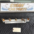 1993-1997 Volvo 850 Fuel Rail & Orange Injectors Naturally Aspirated Used. Price: $75.00.