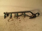 2.3L Non-turbo Fuel Injectors With Rail For 1993 Saab 9000 Used. Price: $104.95.