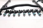 Set **with Rail 53031731AF**FUEL Injectors For Dodge Ram 1500 250 350 V8 5.7 Remanufactured. Price: $274.99.